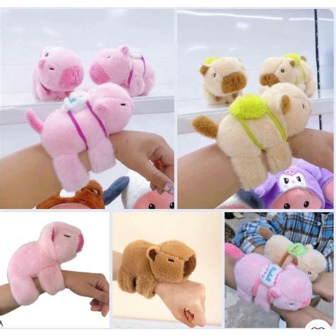 Vòng tay chuột lang capybara gấu bông đập tay siêu hot quẫy đuôi vui nhộn phụ kiện treo xe