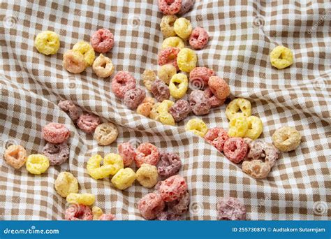 Breakfast Cereal Concept Colorful Ring Cereals For Breakfast Meal On Gingham Cloth Stock Image