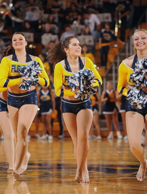 Members Of The Kent State Dance Team Perform During A Time Out At A