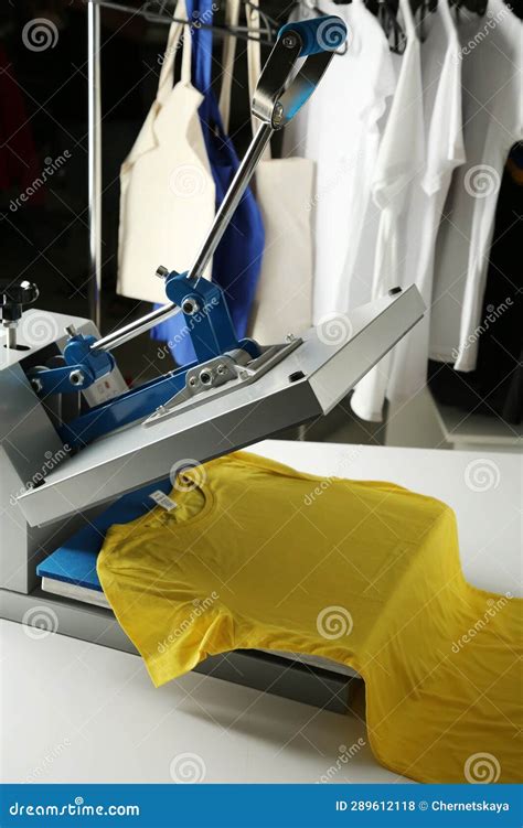 Printing Logo. Heat Press with Yellow T-shirt on White Table Stock ...