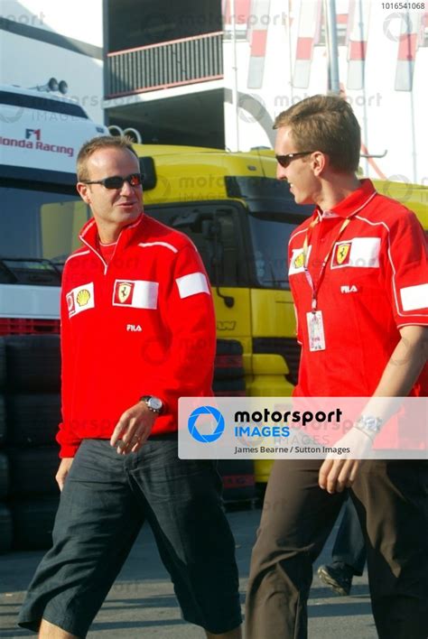 L To R Rubens Barrichello Bra Ferrari Talks With Luciano Burti