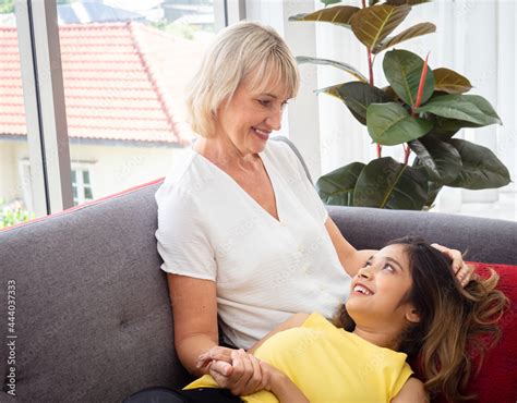 The Adopted Caucasian Mother Care Of Her Asian Teen Daughter While She Is Sleeping On Her Lap