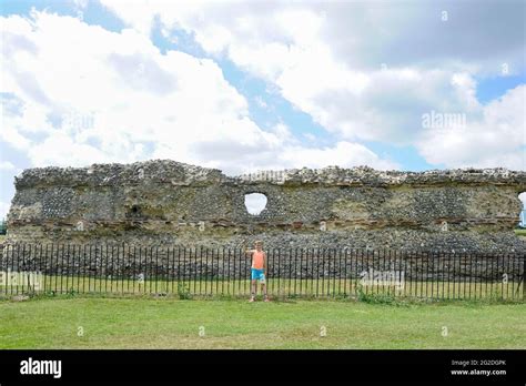 Kid looking at the roman ruins in St Albans, England Stock Photo - Alamy