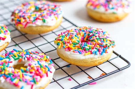 Vanilla Frosted Doughnuts With Sprinkles