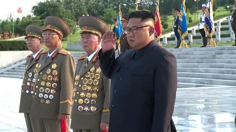 Kju Visits Cemeteries And Attends Photo Session With War Veterans