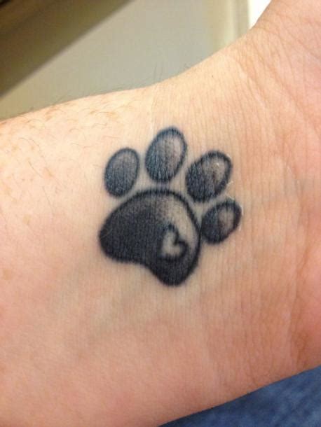 Lovely Cat Paw Print Tattoo Idea