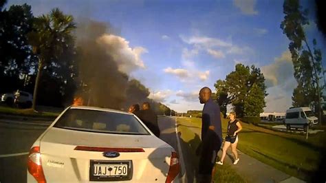 Watch Video Shows Officers Saving Unconscious Woman From Burning