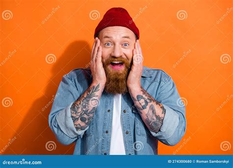 Portrait Of Impressed Positive Person Arms Touch Cheeks Open Mouth Isolated On Orange Color