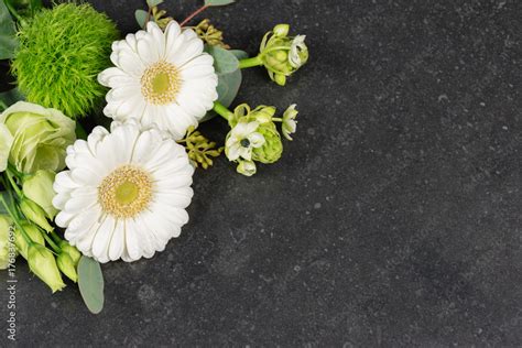 White flowers background / Top view of white fresh flowers on granite ...