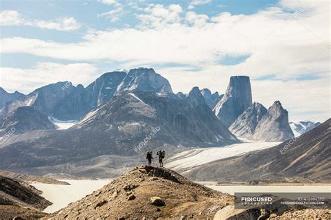 Auyuittuq national park hiking scene — outdoors, Carrying - Stock Photo ...