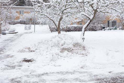 Houses in the Suburbs. Winter in Finland Street and Houses Covered with ...