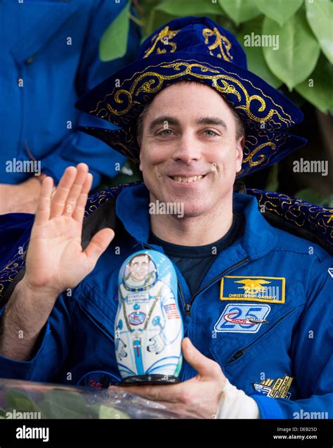 Nasa Expedition 36 Flight Engineer Chris Cassidy Waves During A Ceremony At The Karaganda