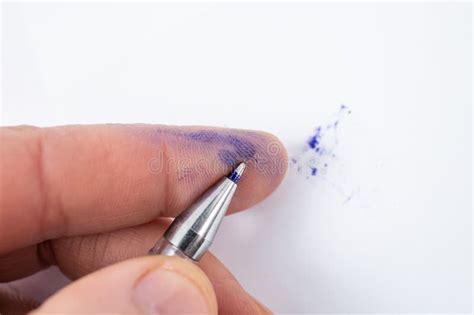 Ball Point Pen Spilling Blue Ink On Index Finger Print Soft Focus