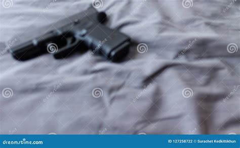 Gun On Bed Ready To Protect From Another Bad People Bandw Crime Scene