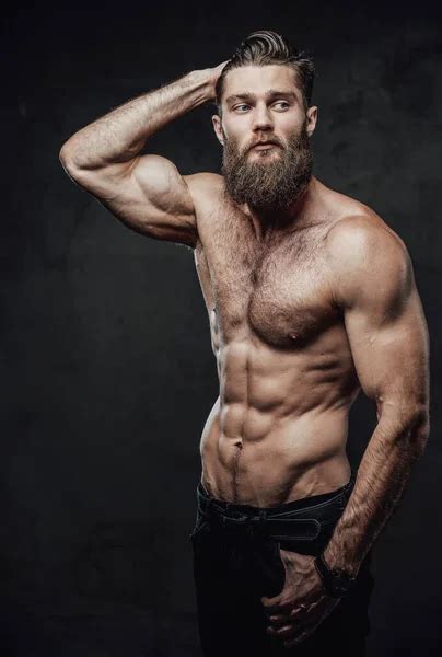 Bearded Guy With Naked Torso Posing In Dark Background Stock Photo By