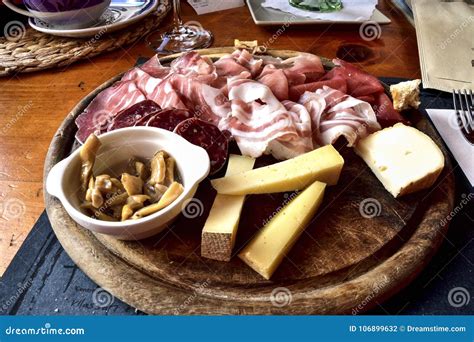 Platter of Cold Cuts and Mixed Cheeses Stock Photo - Image of setting, cooking: 106899632