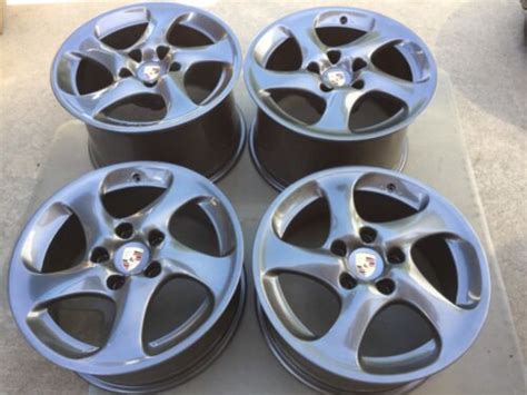 18 NEW GUNMETAL OEM PORSCHE 911 996 997 TURBO TWIST HOLLOW SPOKE