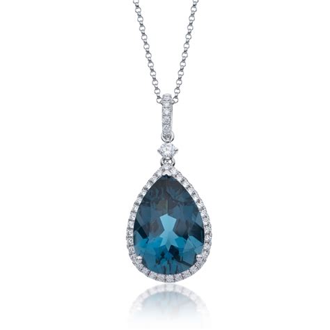 18ct White Gold 1010ct Pear Cut London Blue Topaz And 050ct Diamond