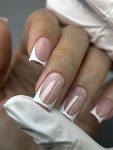 Elegant French Tip Nails For April With Glossy Nude Base And Soft