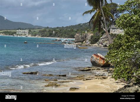 An Old Rusty Boat On An Empty Beach Near The Promenade Of Esperanza A