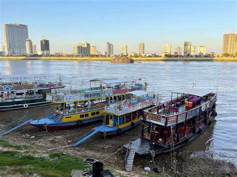 Riverside Strolls Traditional Boats, Phnom Penh, Cambodia Stock Image ...