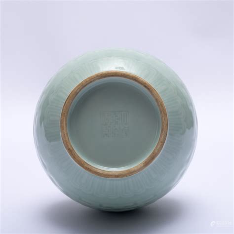 Bidlive A Celadon Glazed Vase