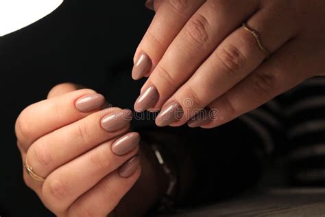 Closeup Of Female Fingers With A Nude Color Nail Art Manicure Stock Photo Image Of Year