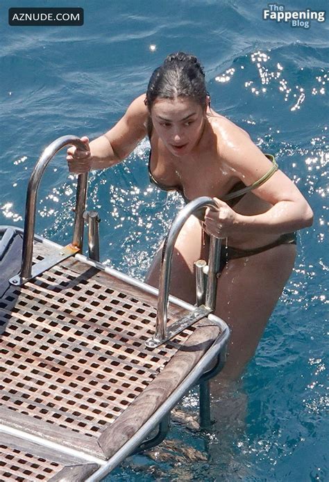 Charli Xcx Sizzles In The Italian Sun In Her Sexy Skimpy Green Bikini