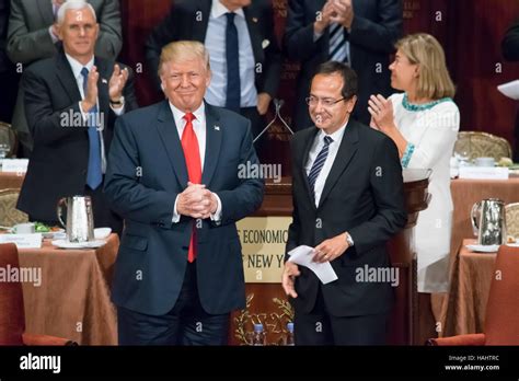 Donald Trump and John Paulson at the conclusion of a speech Stock Photo