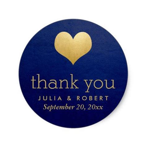 A Round Blue And Gold Wedding Sticker With The Words Thank You Written