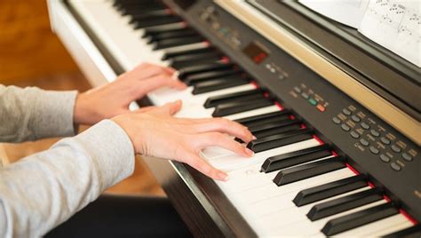 Premium Photo Woman Learning To Play The Electronic Piano