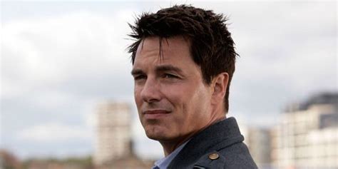 John Barrowman says "it's up to Chris Chibnall" to bring Torchwood back