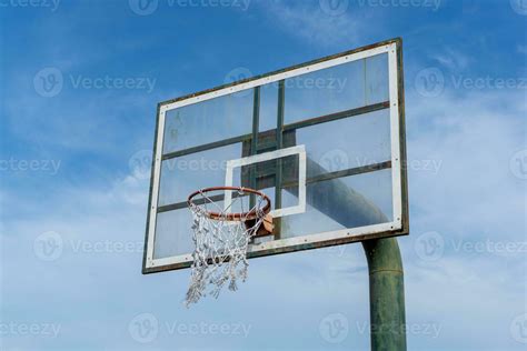 Low angle view of basketball ring on sky background. Outdoor basketball ...