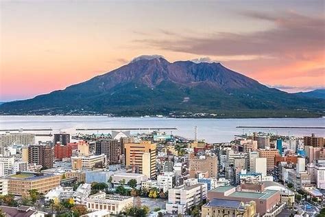 Kagoshima, Japan skyline with Sakurajima Volcano at dusk