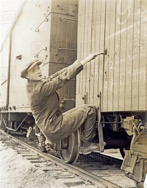 Female Hobo Climbing Freight Train Stock Photo Dissolve