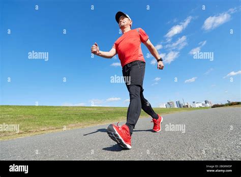 Mature Japanese Man Training Downtown Stock Photo Alamy