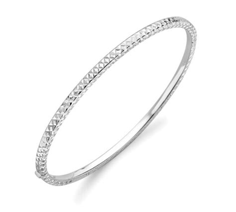 Ct White Gold Diamond Cut Patterned Oval Hinged Bangle Tb Mitchell