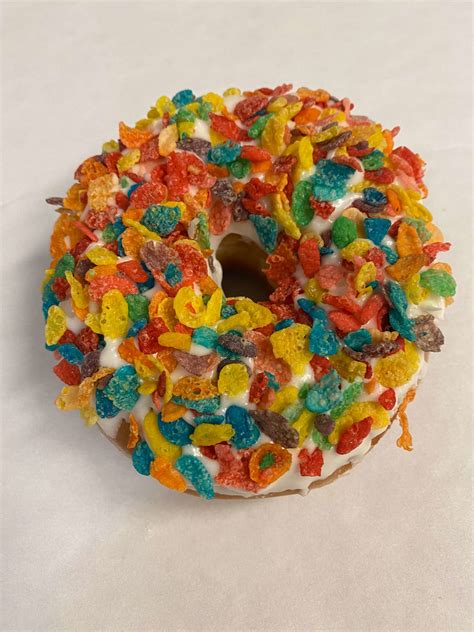 White Iced Raised Ring With Fruity Pebbles Donut Wedding Cakes