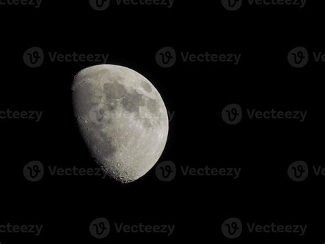 Gibbous moon seen with telescope 3164981 Stock Photo at Vecteezy