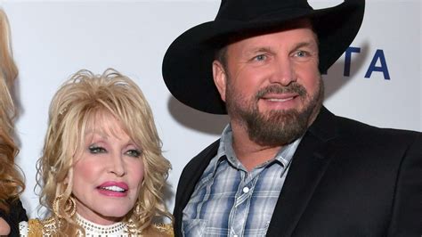 What We Know About Dolly Parton And Garth Brooks' Relationship