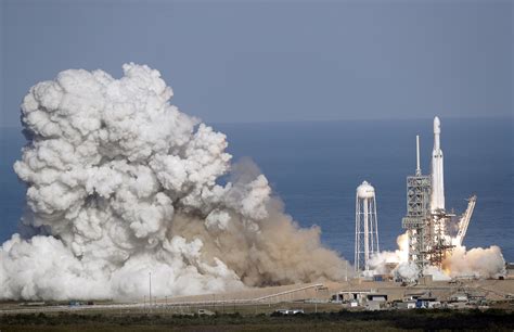 SpaceX's Big New Rocket Blasts Off With Tesla on Top