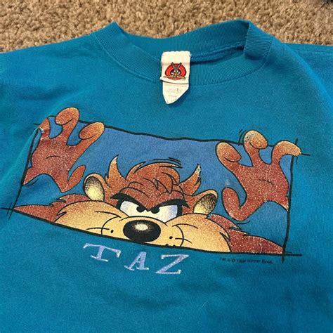 Vintage Looney Tunes Taz Pullover Has Discoloration Depop