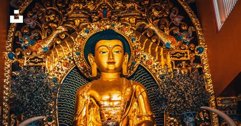 Gold buddha statue with blue and gold background photo – Free Building ...