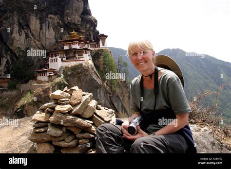 Bhutan Taktsang Tigers Nest Monastery Female Western Trekker Resting