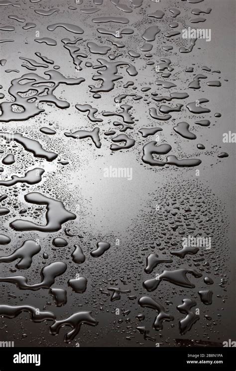 Water droplets on black background Stock Photo - Alamy