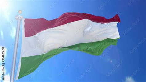 Vidéo Stock Hungary animated flag in the wind with blue sky in the