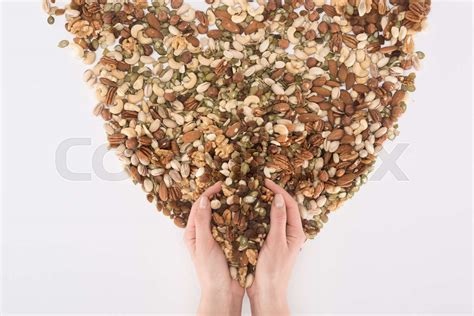 human hands and various nuts | Stock image | Colourbox