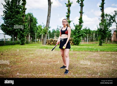 Beautiful Sport Woman Tennis Player With Racket In Sportswear Costume