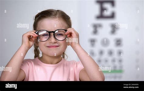 Female Child With Poor Eyesight Happy To Wear Comfortable Eyeglasses