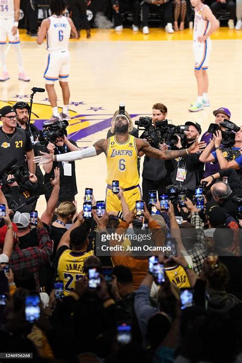 Lebron James Of The Los Angeles Lakers Throws Chalk In The Air Before